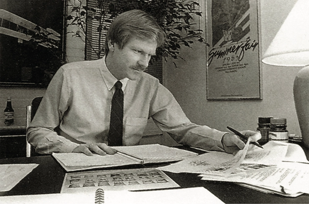 Jerry Kathman reviewing work early in his career
